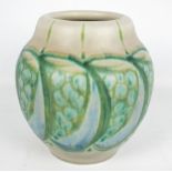 A Royal Lancastrian vase of ovoid form decorated in green with stylised floral motifs on light grey