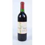 A bottle of Chateau Lynch Bages Grand Cru Classe Pauillac 1989, level to lower neck.