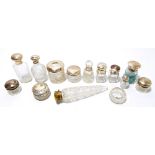 A collection of hallmarked silver topped and hallmarked silver mounted glass,