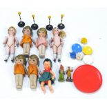 A group of miniature bisque dolls, Dinky traffic accessories,