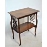 An early 20th century mahogany occasional table with shaped rectangular top and bead decorated