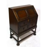 An early 20th century oak bureau,