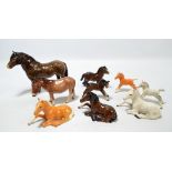 Six Beswick figures of horses including two 'Foal (Lying)', a small stretchered foal (af),