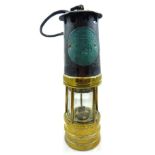 A circa 1900 Ackroyd & Best Type 01 miner's safety lamp, height 26.5cm.