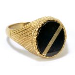 A 9ct yellow gold gentleman's signet ring set with oval vacant black onyx cartouche,