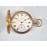 ELGIN; a gold plated hunter cased pocket watch, the white enamel dial with subsidiary seconds.