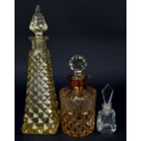 Three late 19th/early 20th century cut glass scent bottles comprising tapered example (stopper af),