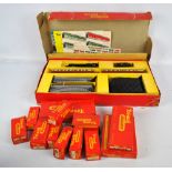 A boxed Tri-ang OO/HO gauge model trains set comprising engine, tender,