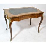 A Louis XV style burr walnut and inlaid writing table,