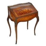 A late 19th century rosewood and marquetry inlaid bureau de dame,