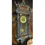 An early 20th century mahogany cased Vienna style eight day wall clock,