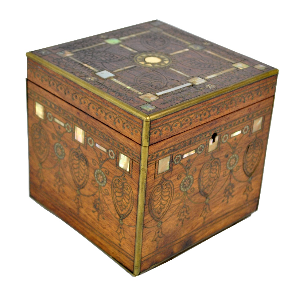 A late 19th/early 20th century Eastern hinged wooden box with inlaid mother of pearl and brass