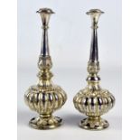 A near pair of circa 1900 Eastern white metal rose water droppers,