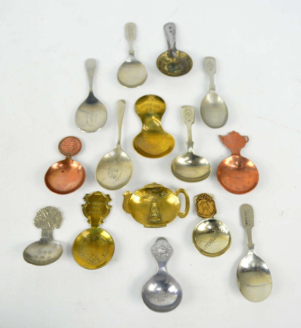 A collection of approximately eighty caddy spoons, including Telcon,