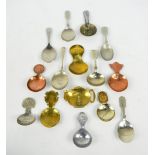A collection of approximately eighty caddy spoons, including Telcon,
