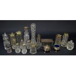 A group of clear cut and pressed glass tableware including mustards, salts etc,