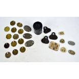 A group of 19th century and later miner's colliery check tallies and tokens, and a coin tin.