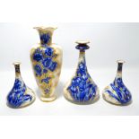 Four Losol Ware 'Blue Iris' 1779 pattern pieces, comprising a baluster vase with flared rim,