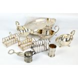 A group of electroplated items to include three toast racks, a pair of sauce boats,