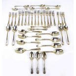 A large group of predominantly Georgian Old English and double thread pattern spoons and forks in