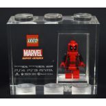 A Lego for TT Games Minifigure acrylic trophy brick, Deadpool from the Marvel Super Hero game,