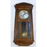 An early 20th century German mahogany cased wall clock,