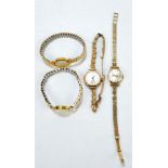 GARRARD; a lady's 9ct yellow gold wristwatch, with circular dial and brick link bracelet,