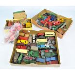 A quantity of loose Dinky diecast model vehicles including cars, trucks,