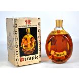 A boxed 1 litre bottle of 12 Year Old Dimple De-luxe Scotch whisky, from circa 1985,