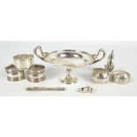 A group of variously hallmarked silver items including a twin handled footed bonbon dish,