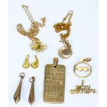 Five various 9ct yellow gold pendants to include a rectangular example engraved with February