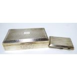 A George V hallmarked silver cigarette case of rectangular form with engraved initials,