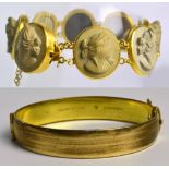 A modern yellow metal mounted sectional oval vulcanite cameo bracelet, length 18cm,