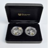 A boxed and cased set of two HM Elizabeth Diamond Jubilee commemorative .