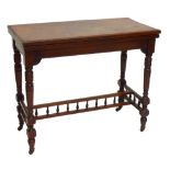 A late Victorian oak and mahogany foldover card table,