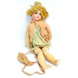 An Armand Marseille bisque headed doll with open/close eyes and open mouth revealing four teeth,