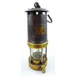 A circa 1915 James Laidler of Durham miner's bonneted flame safety lamp,