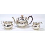ISRAEL SIGMUND GREENBERG; a George V hallmarked silver three piece tea set,