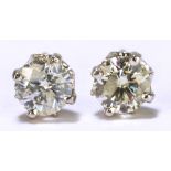 A pair of 18ct white gold diamond ear studs, each diamond weighing approx 0.40ct.