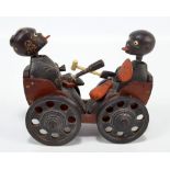 A Japanese Meiji/early Showa period Kobe wooden articulated toy modelled as two stylised musicians