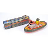 A battery operated tinplate Golden Falcon 6681 train in metallic blue with red and gold detail,