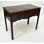 A George III mahogany single drawer side table on square supports.