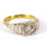 An 18ct yellow and white gold solitaire ring,