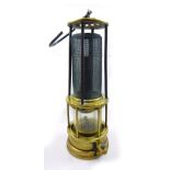 A circa 1880 Clanny style open gauze miner's safety lamp, probably by Davis of Derby, height 24.5cm.