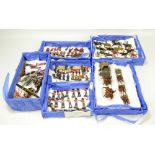 A collection of over one hundred and twenty predominantly Britains painted lead soldiers comprising