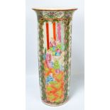 A circa 1900 Chinese Canton Famille Rose sleeve vase decorated with figures,