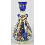 A Persian/Turkish baluster vase with small twin handles,