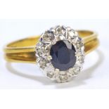 An 18ct yellow gold diamond and sapphire ring,