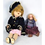 An early 20th century bisque headed Armand Marseille doll marked '390A50XM' with open/close eyes