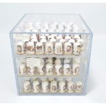 A collection of sets and part sets of Caverswall ceramic thimbles including a large quantity of